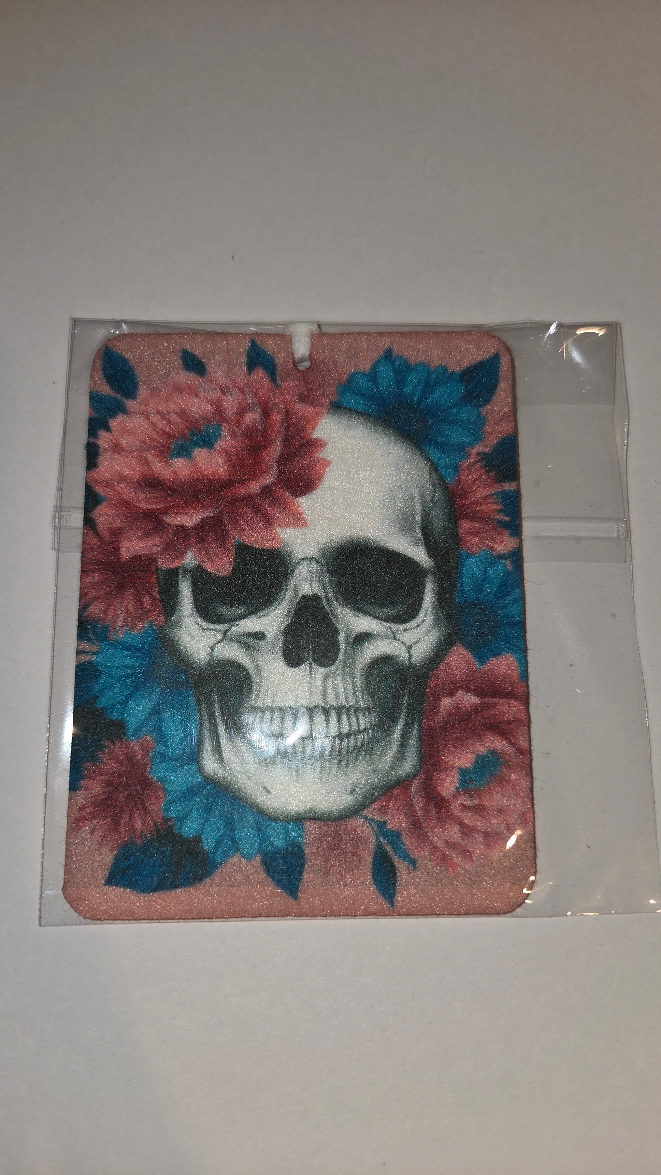 Pink and blue flower skull