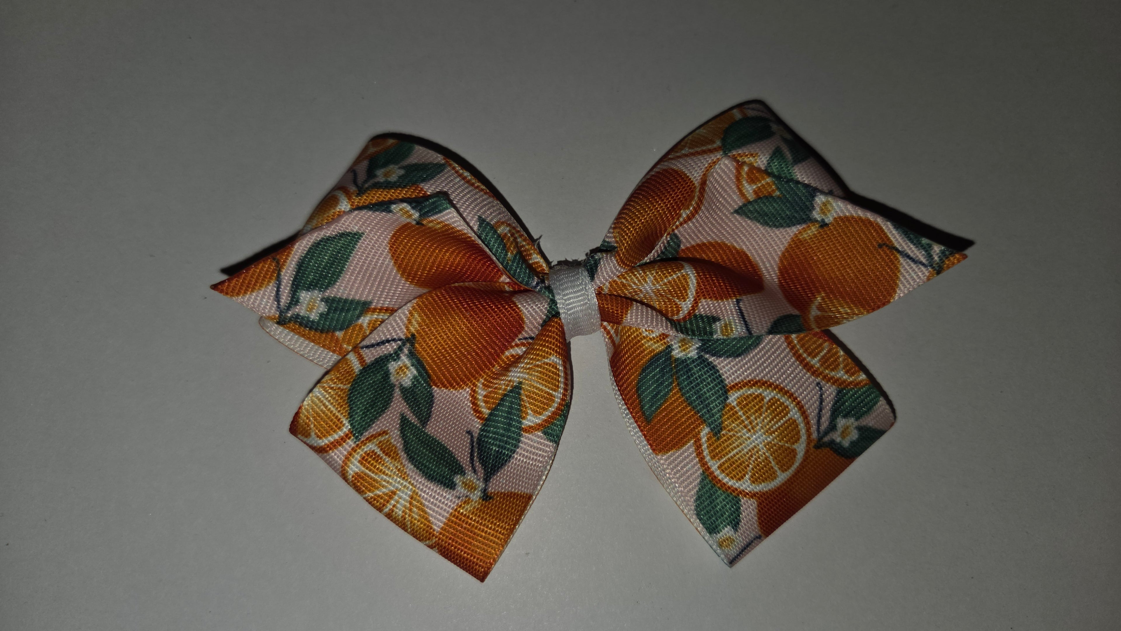Light pink with oranges