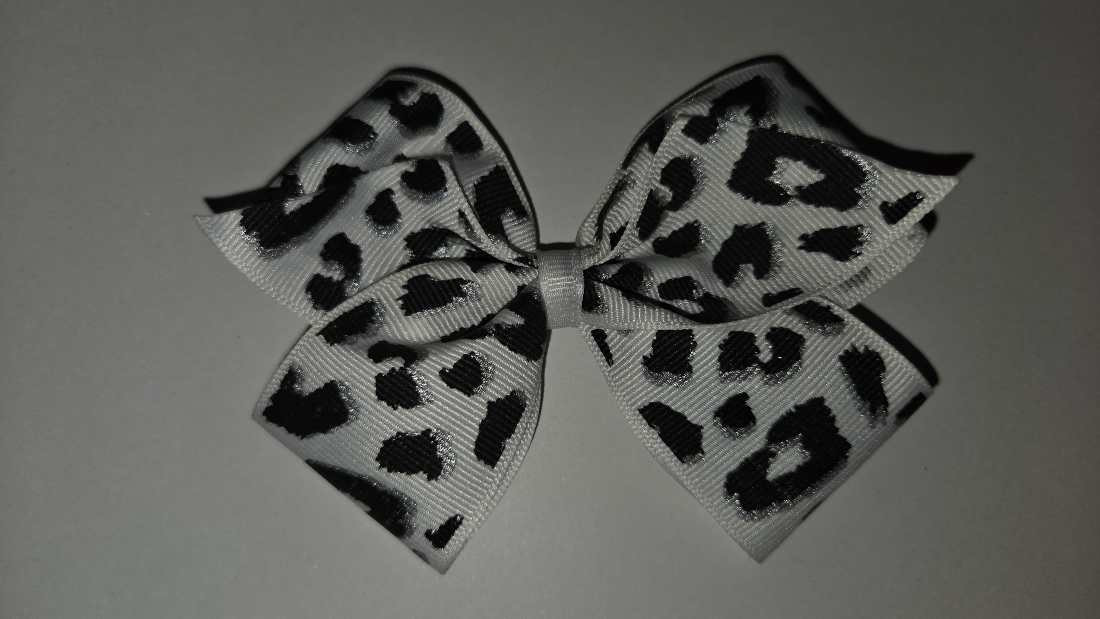 White w/ Black Cheetah print
